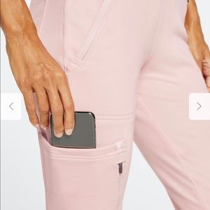 JAANUU Women's 10-Pocket Jogger color Blushing Pink size Small